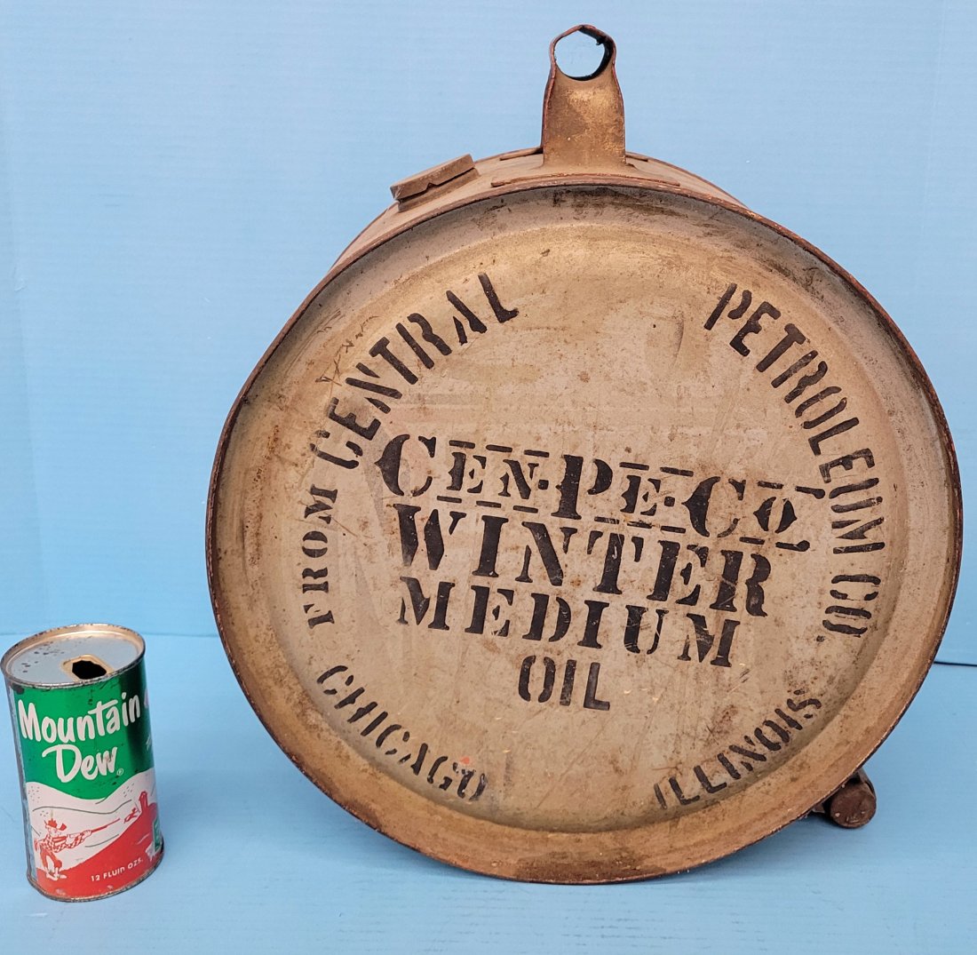 Cen-Pe-Co Winter Medium Oil 5 Gallon Rocker can: 5 gallon rocker oil can with Cen-Pe-Co. Winter Medium Oil painted advertising. Shows normal wear with surface rust, and no graphics on one side. *PLEASE NOTE, THERE IS ONLY ONE WAY TO PAY FOR ONLINE I
