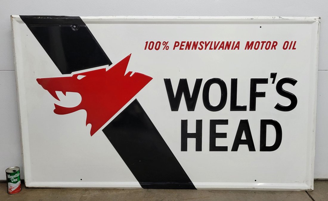 Wolf's Head Motor Oil Embossed Metal Sign (1 of 3)