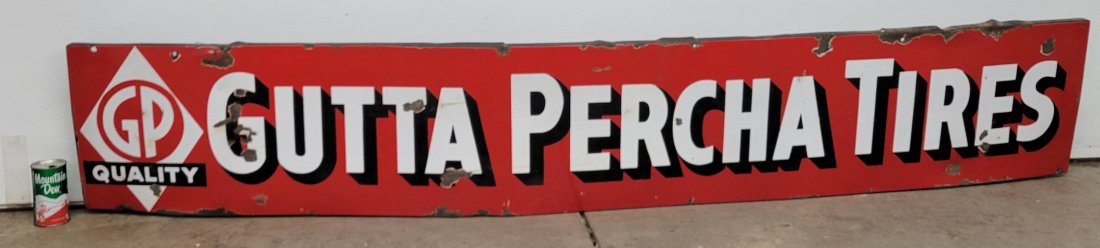 Gutta Pecha Tires Porcelain sign: 84" x 14" Single sided porcelain sign with bright colors, porcelain chips and scuffs, and edge wear. *PLEASE NOTE, THERE IS ONLY ONE WAY TO PAY FOR ONLINE ITEMS IN THIS AUCT