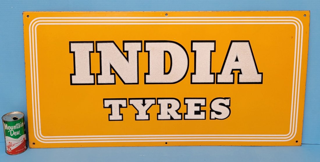 India Tyers smaltz on porcelain sign: 36" x 18" Very clean smaltz porcelain sign in excellent condition with bright colors. *PLEASE NOTE, THERE IS ONLY ONE WAY TO PAY FOR ONLINE ITEMS IN THIS AUCTION WHICH
