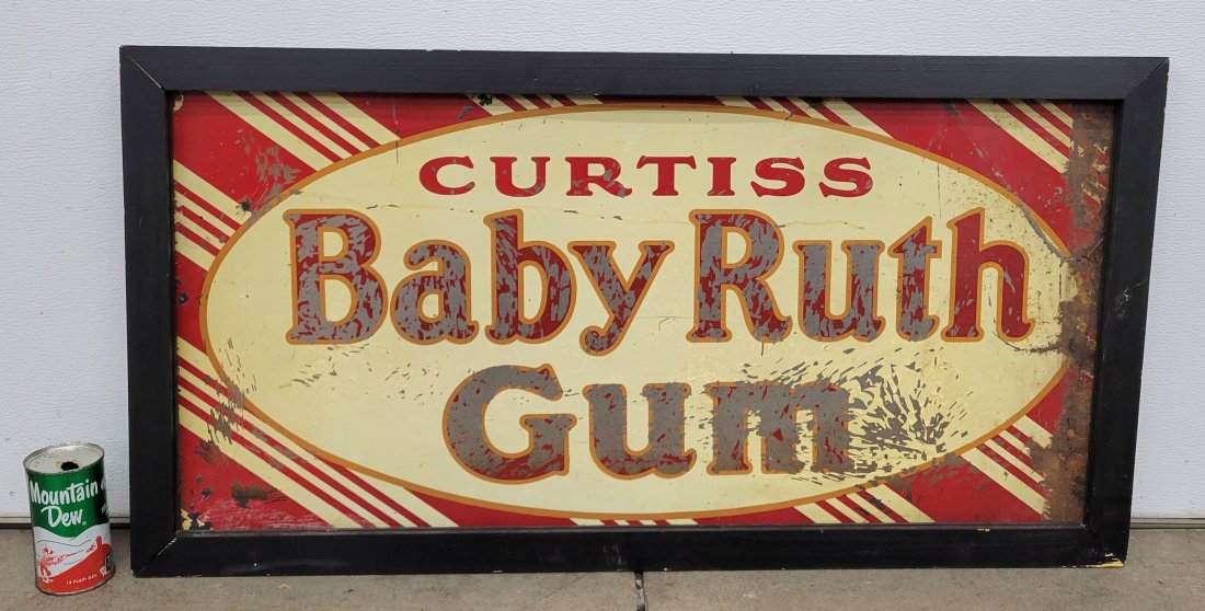 Curtiss Baby Ruth Gum sign: 37.5" x 19.5" Metal sign that is loosely tacked to a frame. The sign has scuffs, scratches, paint flakes, rust and stains. *PLEASE NOTE, THERE IS ONLY ONE WAY TO PAY FOR ONLINE ITEMS IN THIS AUCTION W