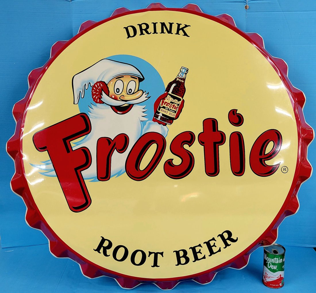 Drink Frostie Root Beer w/Logo holding a bottle Metal Bottle Cap Sign: SST bottle cap sign has excellent color and shine, very light wear, marked Stout, 39"D., rated 9.25. TAC #041787PLEASE NOTE, THERE IS ONLY ONE WAY TO PAY FOR ONLINE ITEMS IN THIS AUCTION WHICH IS THRO