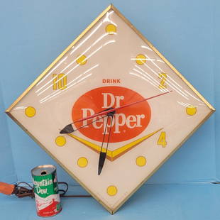 Dr. Pepper Pam Clock: 22" x 22" Diamond shaped clock with glass face, bright colors, and metal frame and housing. The clock is working. There are no light bulbs in the clock so the lighting is untested.