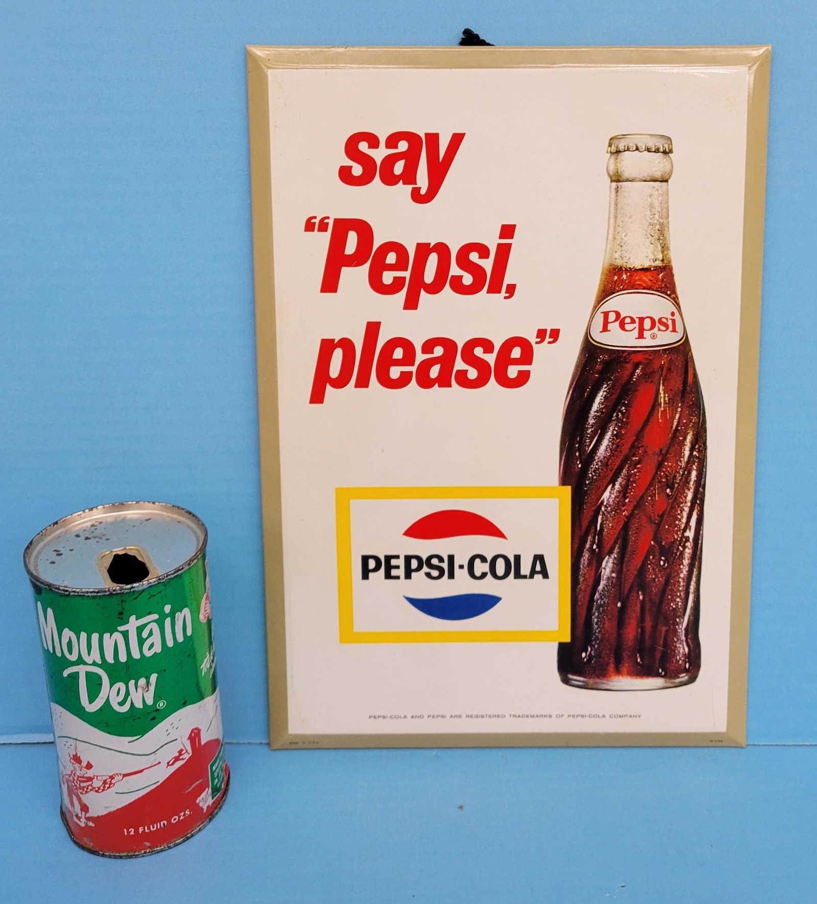Say Pepsi Please Single Sided Tin Sign: Single sided tin sign over cardboard in excellent condition with bright colors and high gloss. The sign can be hung with the string or can be displayed using the easel back. 8.5" x 12". PLEASE NOTE, T