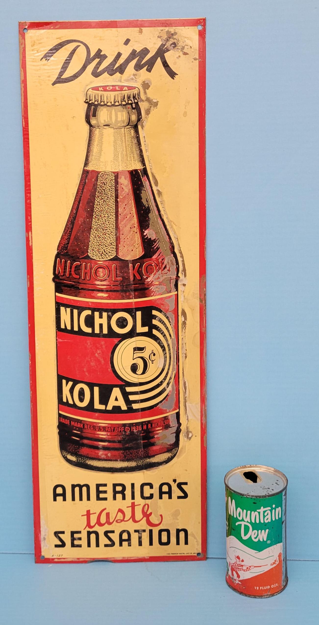 Drink Nichola Kola America's Taste Sensation Tin Sign: Embossed tin sign with some evidence of the paper still on the sign, some flakes on the bottom edge, scuffs. 8" x 24". PLEASE NOTE, THERE IS ONLY ONE WAY TO PAY FOR ONLINE ITEMS IN THIS AUCTION WHICH 