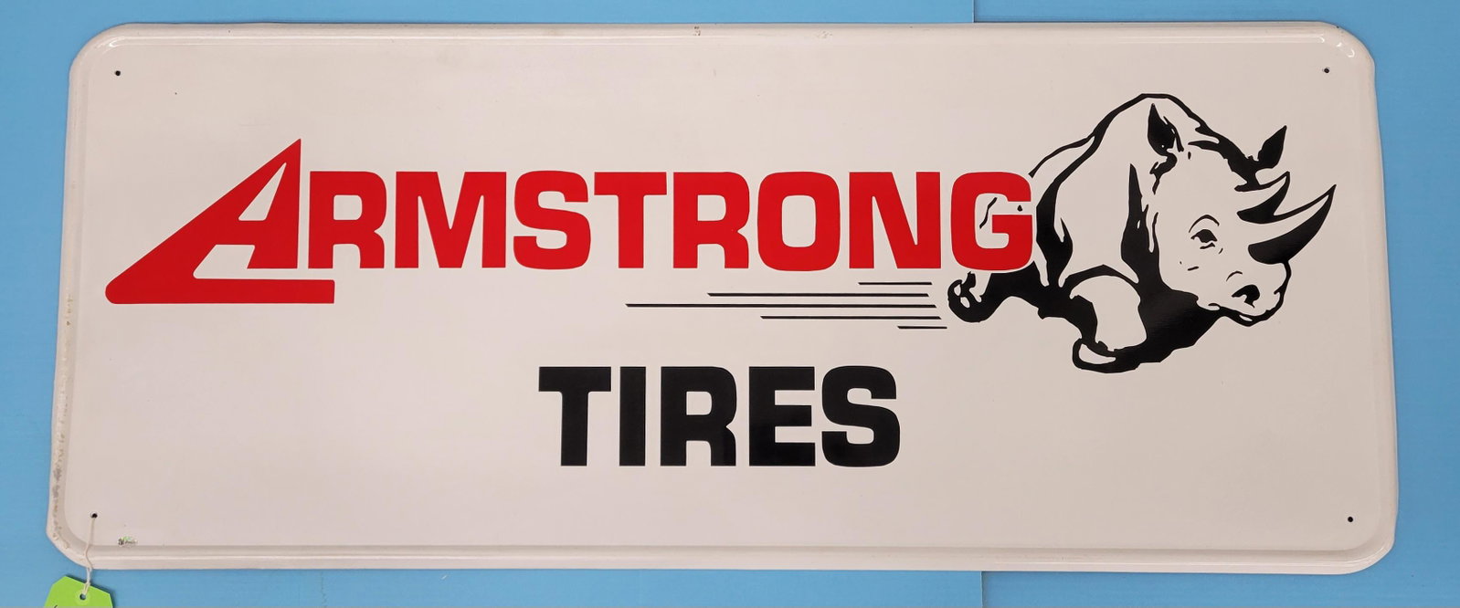 Armstrong Tires Self Framed Sign TAC: Aluminum sign with bright colors, high gloss, minor scuffs in the field with some wear on the outer edge. 48" x 20", TAC #015173. PLEASE NOTE, THERE IS ONLY ONE WAY TO PAY FOR ONLINE ITEMS IN THIS AUC