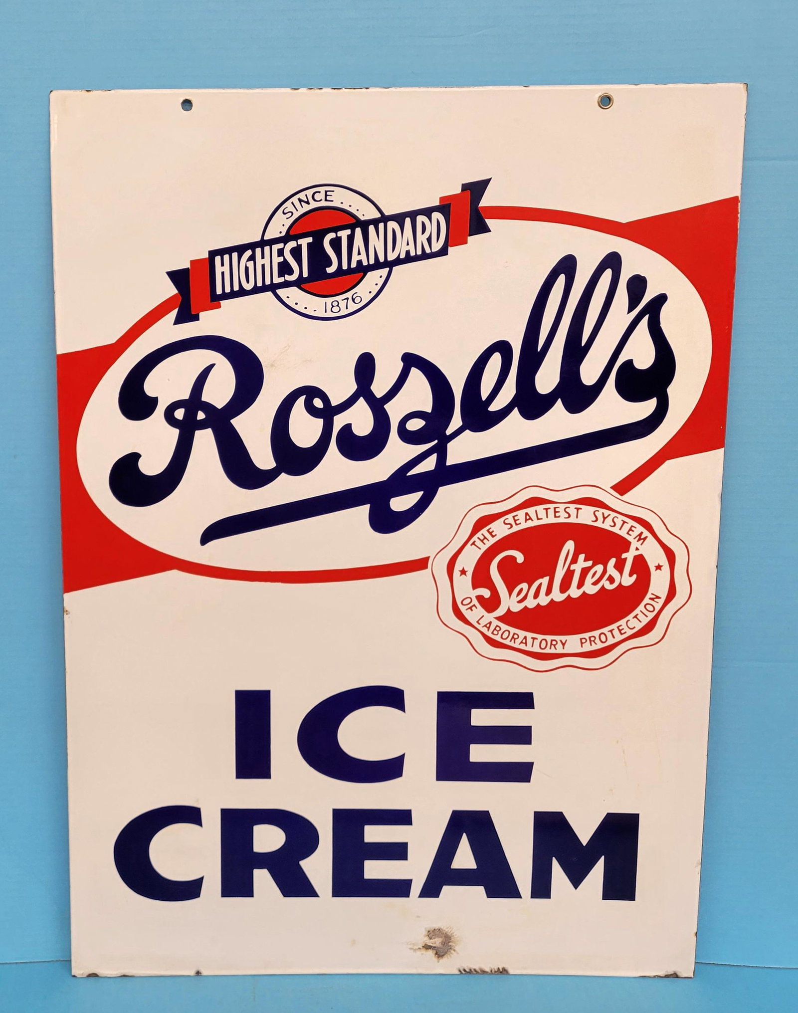 Roszell's Sealtest Ice Cream Double Sided Porcelain Sign: 20" x 28" Double sided porcelain ice cream sign with the Sealtest logo. Sign has bright colors and good gloss on both sides with a porcelain chip at the bottom on both sides. One side has some light s
