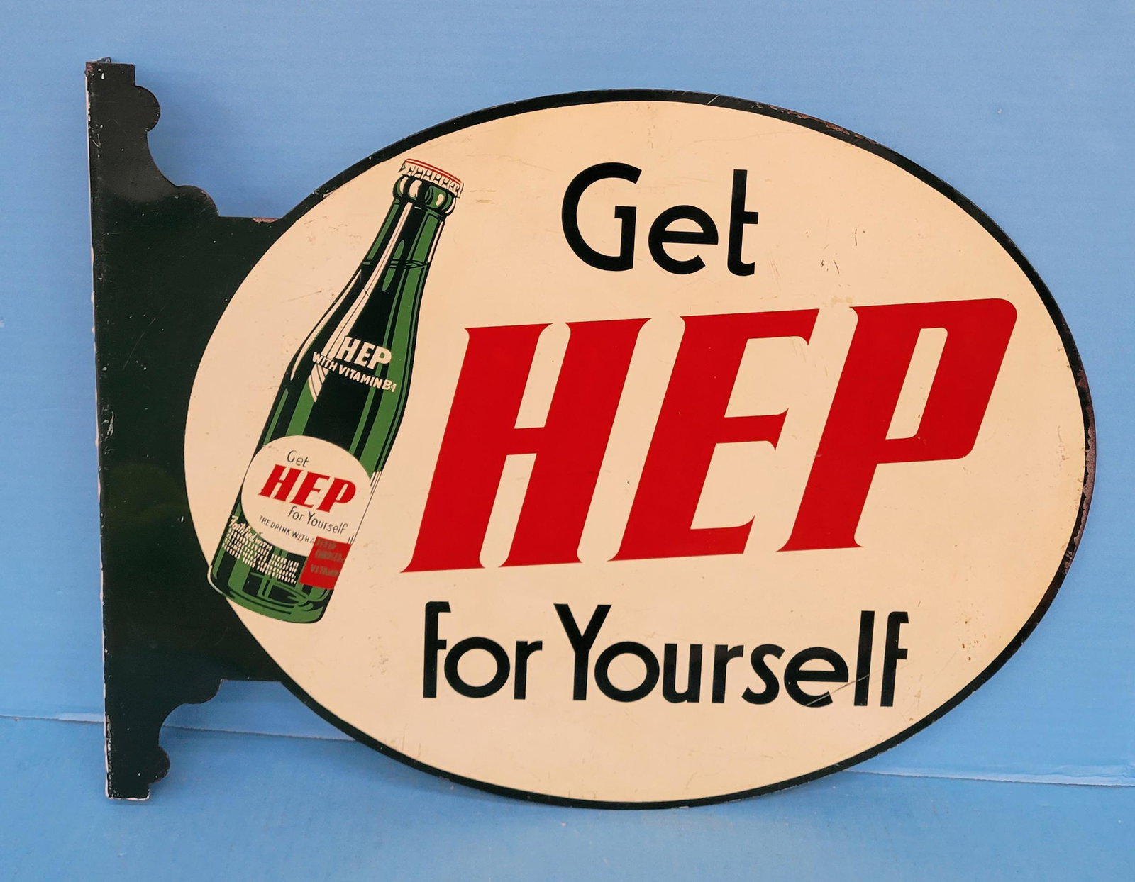 Get Hep For Yourself Metal Flange Sign: 17.75" x 13.25" Metal flange sign with scratches and paint flakes on one side throughout the field. The other side has some scratches in the field. There is edgewear and the flange has flaking paint. 