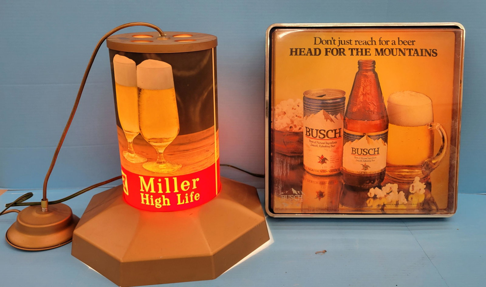 Miller High Life & Busch Light Up Advertising: 14.5" x 15.5" Miller High Life working plastic light with scuffs, scratches. 16" x 16" x 5.5" Busch plastic light up sign with scuffs, and scratches. PLEASE NOTE, THERE IS ONLY ONE WAY TO PAY FOR ONLI