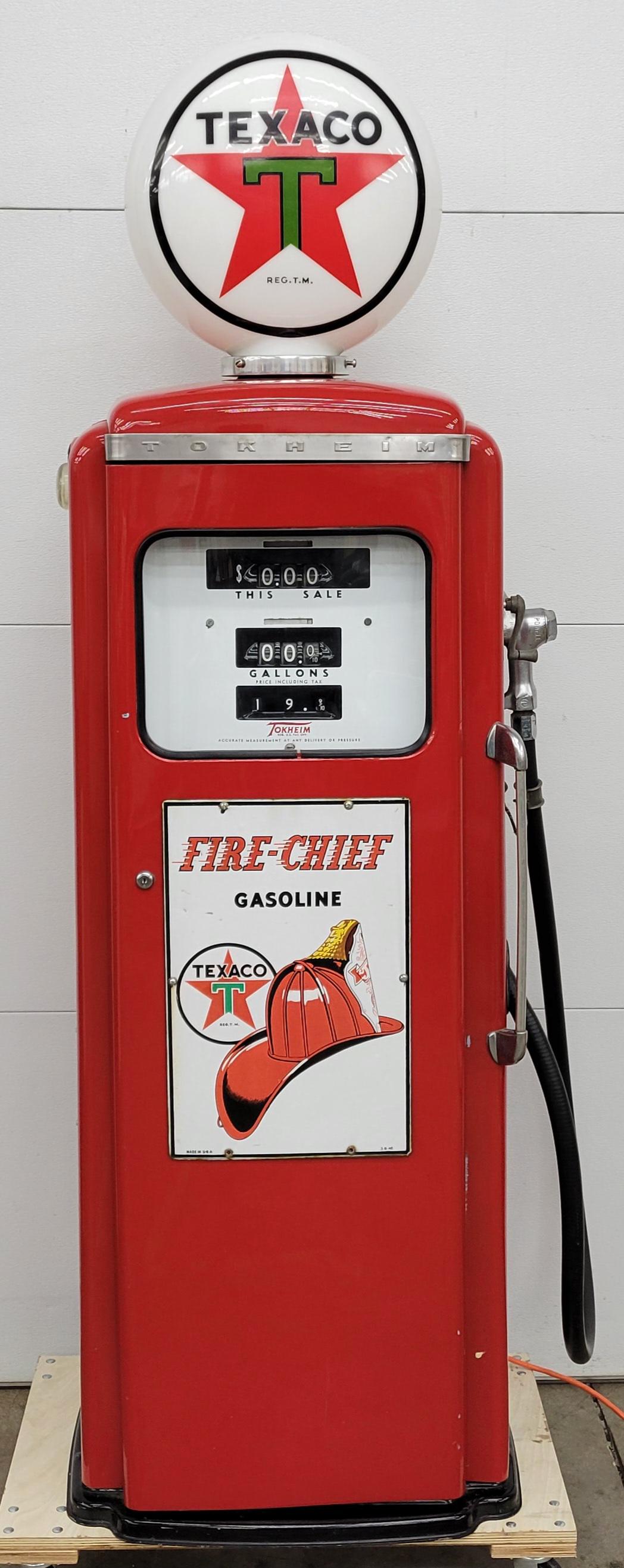 Texaco Fire Chief Restored Gas Pump: 24" x 19" x 74"h Older professionally restored Tokheim gas pump with 1946 porcelain pump plates, original pump faces, new hose, and reproduction milk glass Texaco globe. The pump shows bright colors w