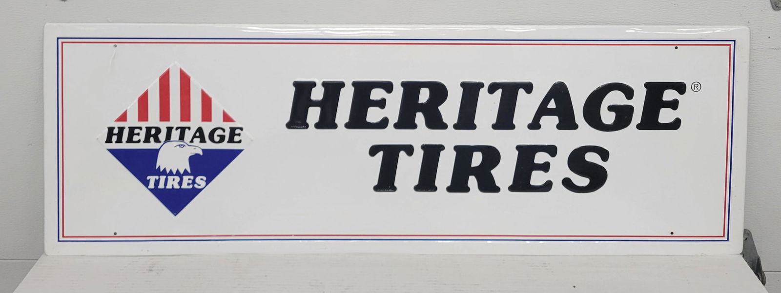 Heritage Tires Single Sided Embossed Tin Sign (1 of 1)