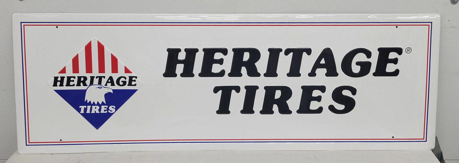 Heritage Tires Single Sided Embossed Tin Sign (1 of 1)