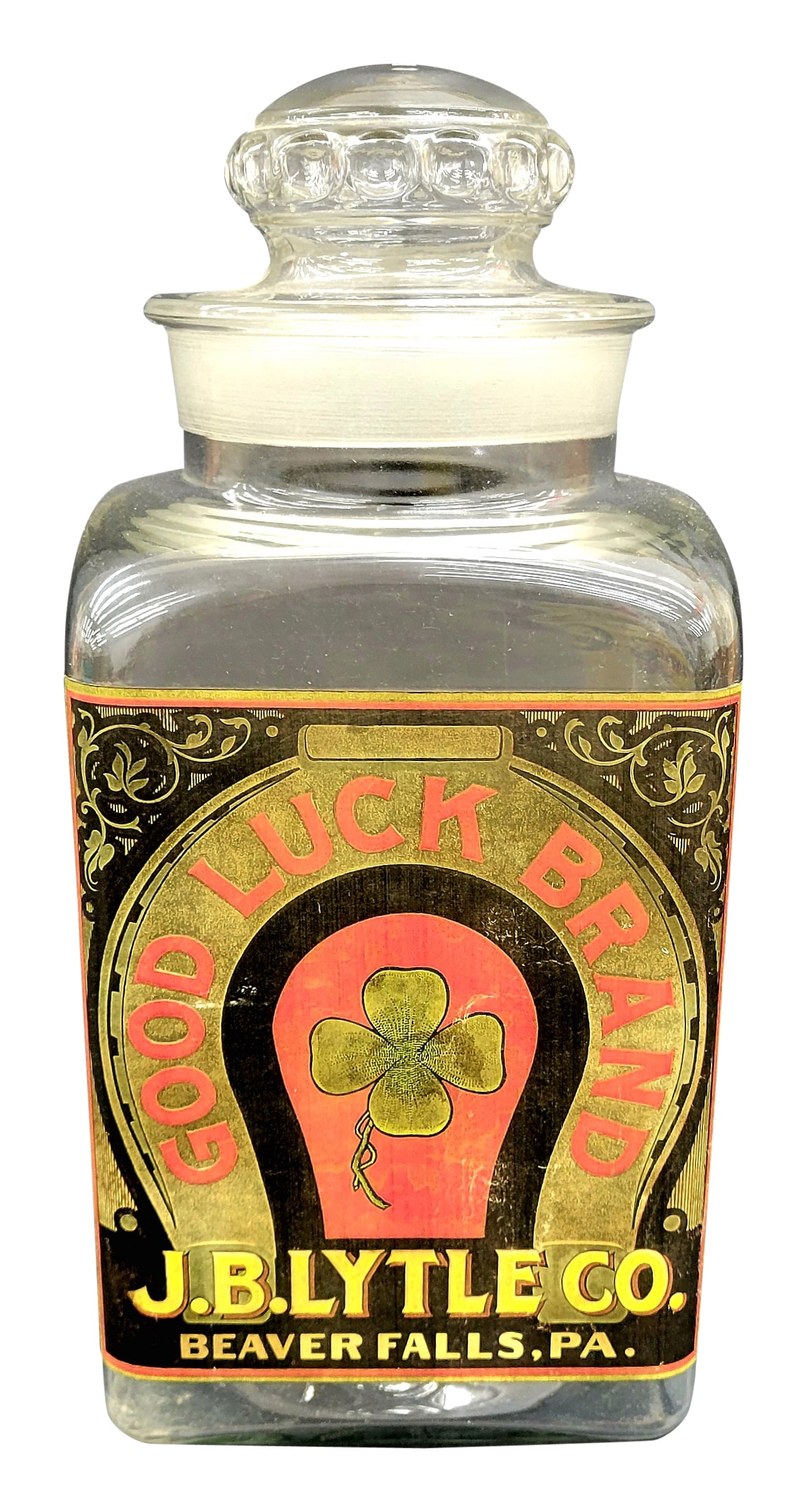 Good Luck Brand J.B. Lytle Co. Glass Jar: Glass jar with glass lid in very good condition with paper label. Label has bright color with 4 leaf lucky clover graphics. 12.5" x 6".PLEASE NOTE, THERE IS ONLY ONE WAY TO PAY FOR ONLINE ITEMS IN THI