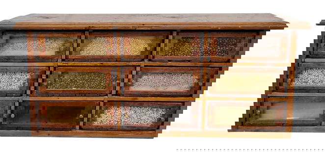 1800's Rare Counter Top Seed Cabinet: Very rare size wood counter top cabinet with 9 drawers, brass pulls. Possibly a salesman sample but we cannot confirm that to be true. We can say that we have never seen this type of cabinet in this s