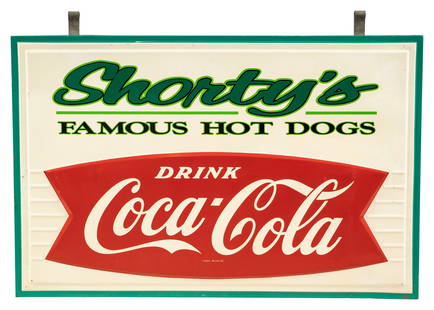 Drink Coca Cola Fishtail Embossed Double Sided Tin Sign "Shorty's Famous Hotdogs": Two SST embossed tin signs mounted back-to-back have very good color and shine. Side #1 has light wear in the field and around the perimeter. The reverse is similar with scratches in the fishtail