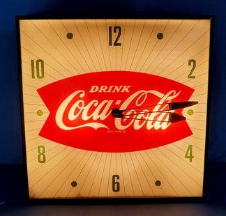 Drink Coca Cola Pam Fishtail Clock: Working Pam light up clock with glass face. Excellent condition with a minor scratch in the fishtail. Metal can has light wear. 15.25" x 3.5". PLEASE NOTE, THERE IS ONLY ONE WAY TO PAY FOR ONLINE ITEM