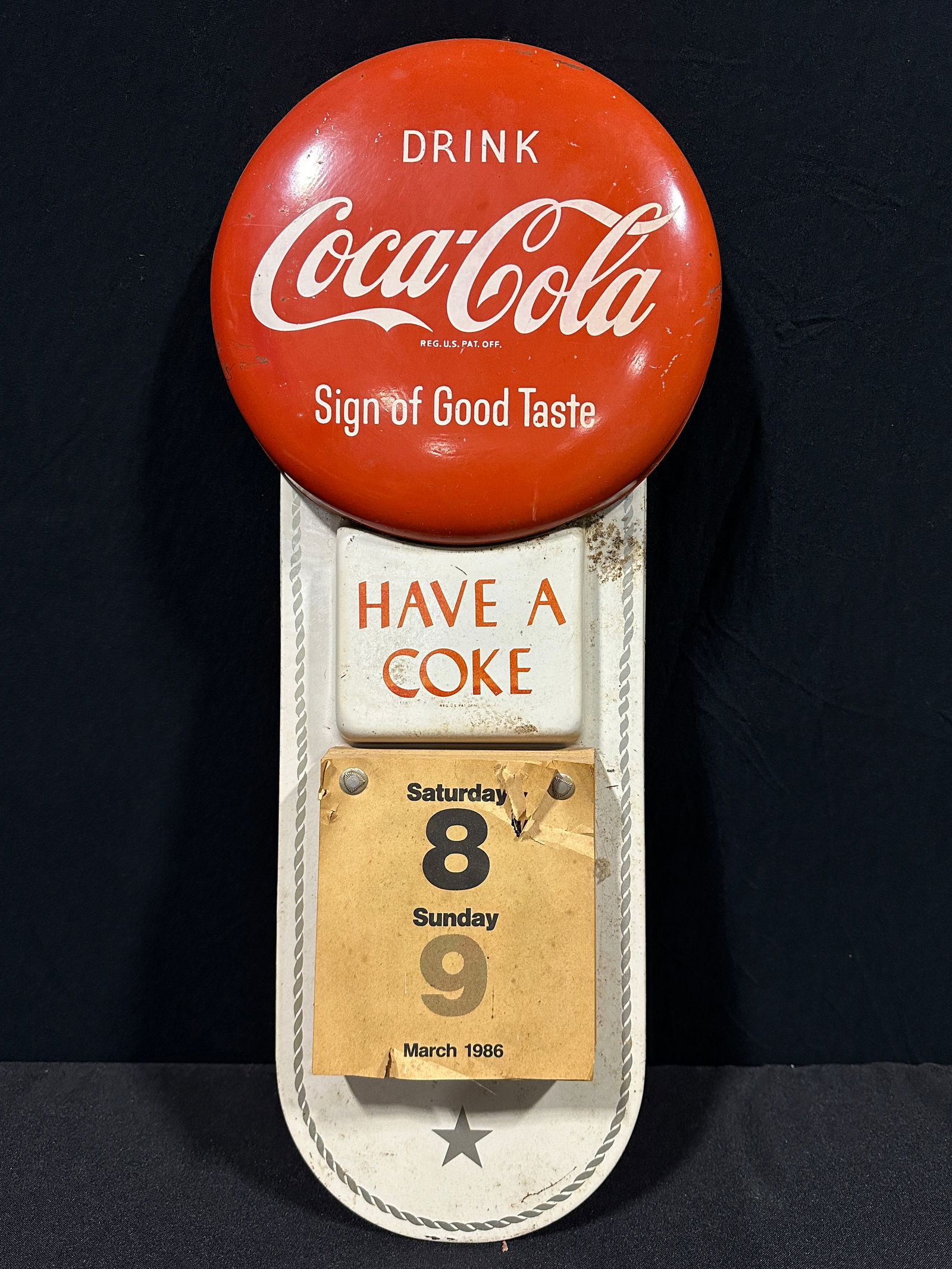 Coca Cola have a Coke tin metal calendar sign (1 of 2)