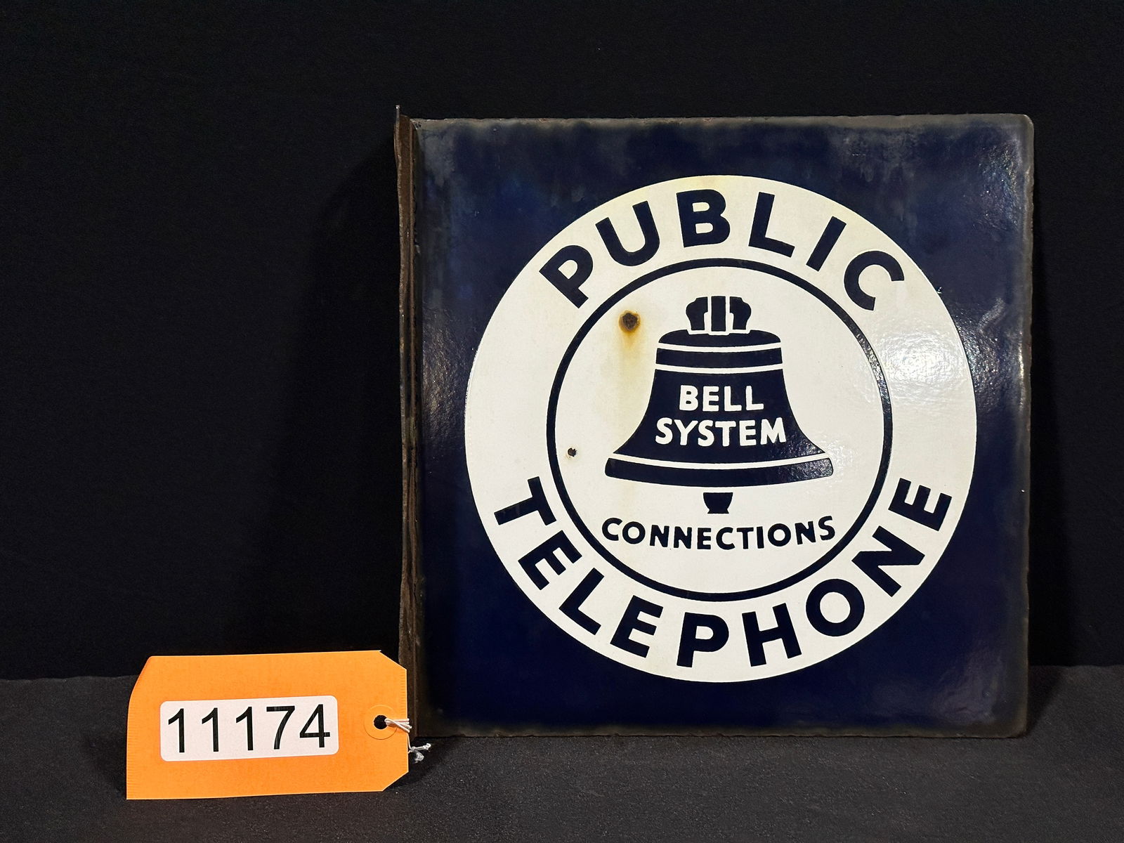 Bell System public telephone porcelain flange sign (1 of 2)