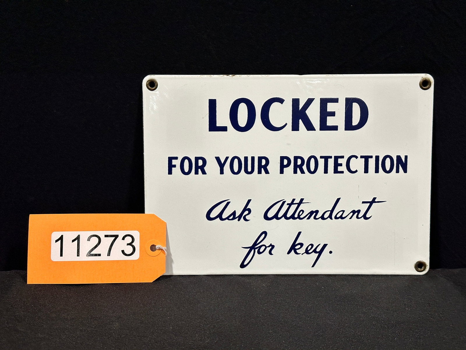 Locked for protection bathroom restroom porcelain sign: SSP (single sided porcelain) locked for your protection attendant has key porcelain sign. 7" H x 10" W.