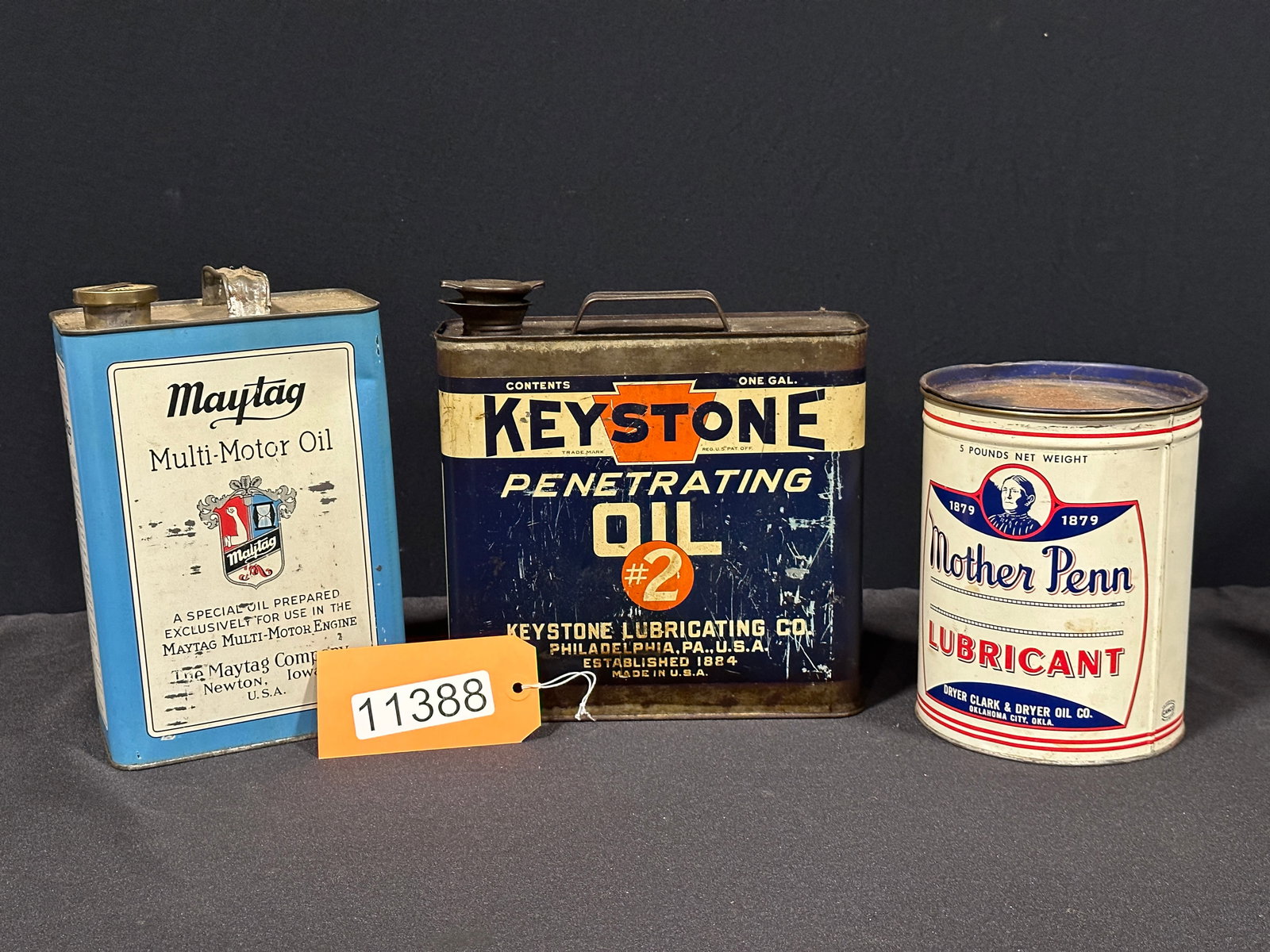 Mother Penn Maytag Keystone penetrating motor oil can: Maytag and keystone are full, mother Penn is empty.