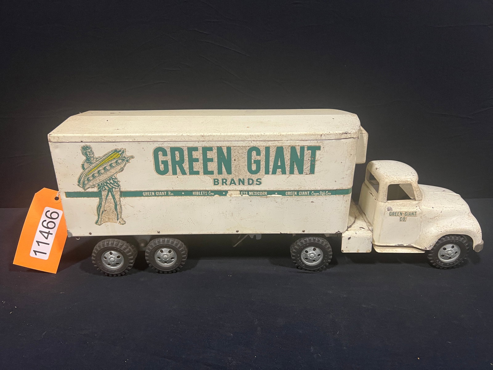 Tonka Green Giant brands toy metal truck and trailer: Tonka green giant brands truck. 18" H x 10" W x 6" D.