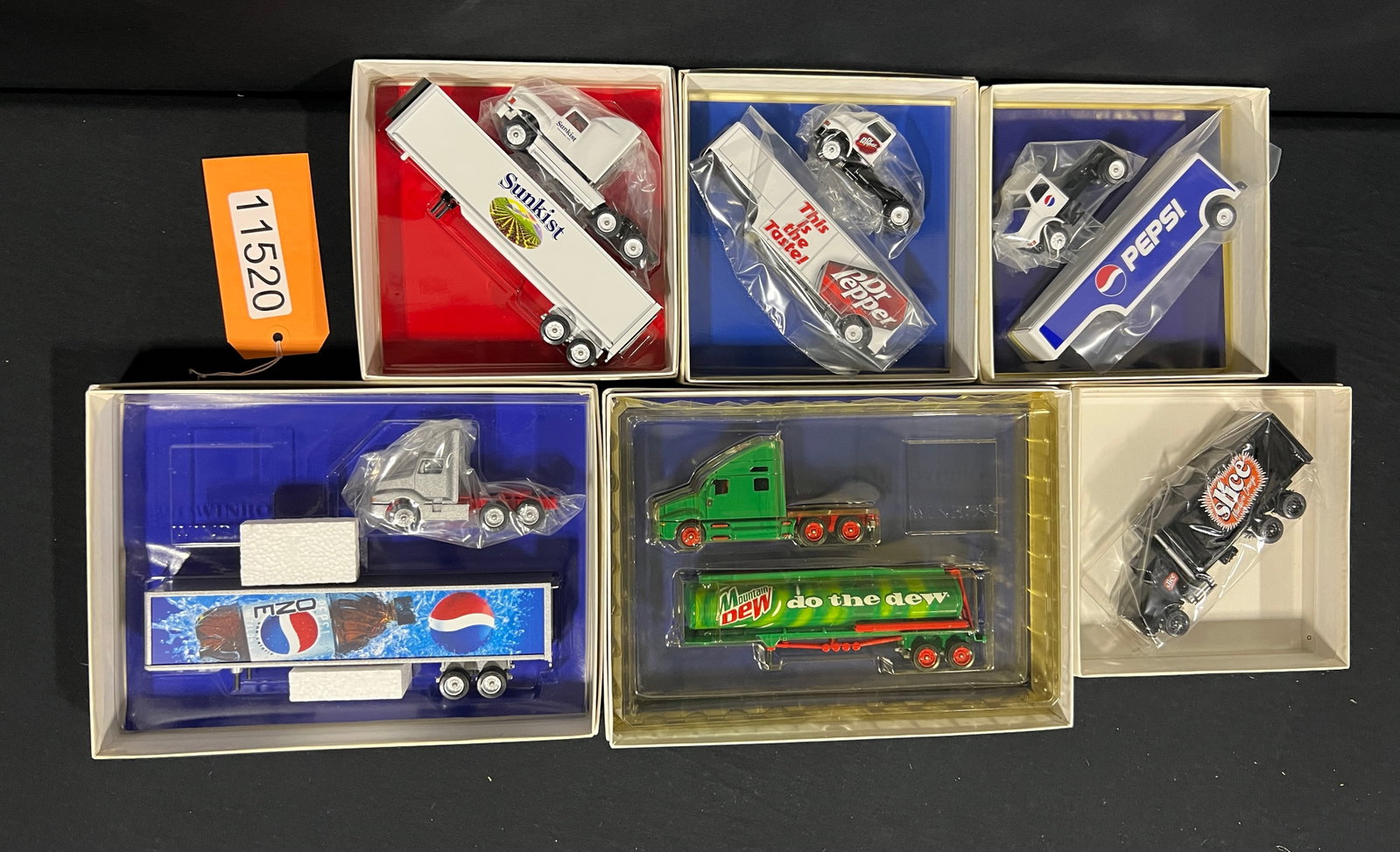 Winross Sunkist Slice Pepsi Dr Pepper Mountain Dew: 6 Winross Slice Pepsi Slice Dr Pepper Mountain Dew Trucks. 7" H x 7" W x 4" D.