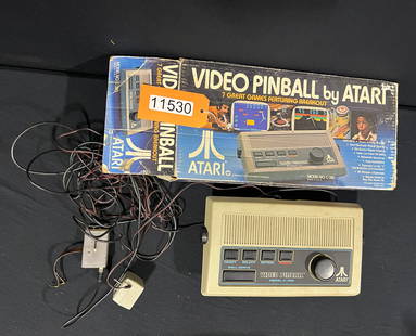 Atari Video pinball game featuring breakout: Assume non working condition. 24" H x 8" W x 8" D.