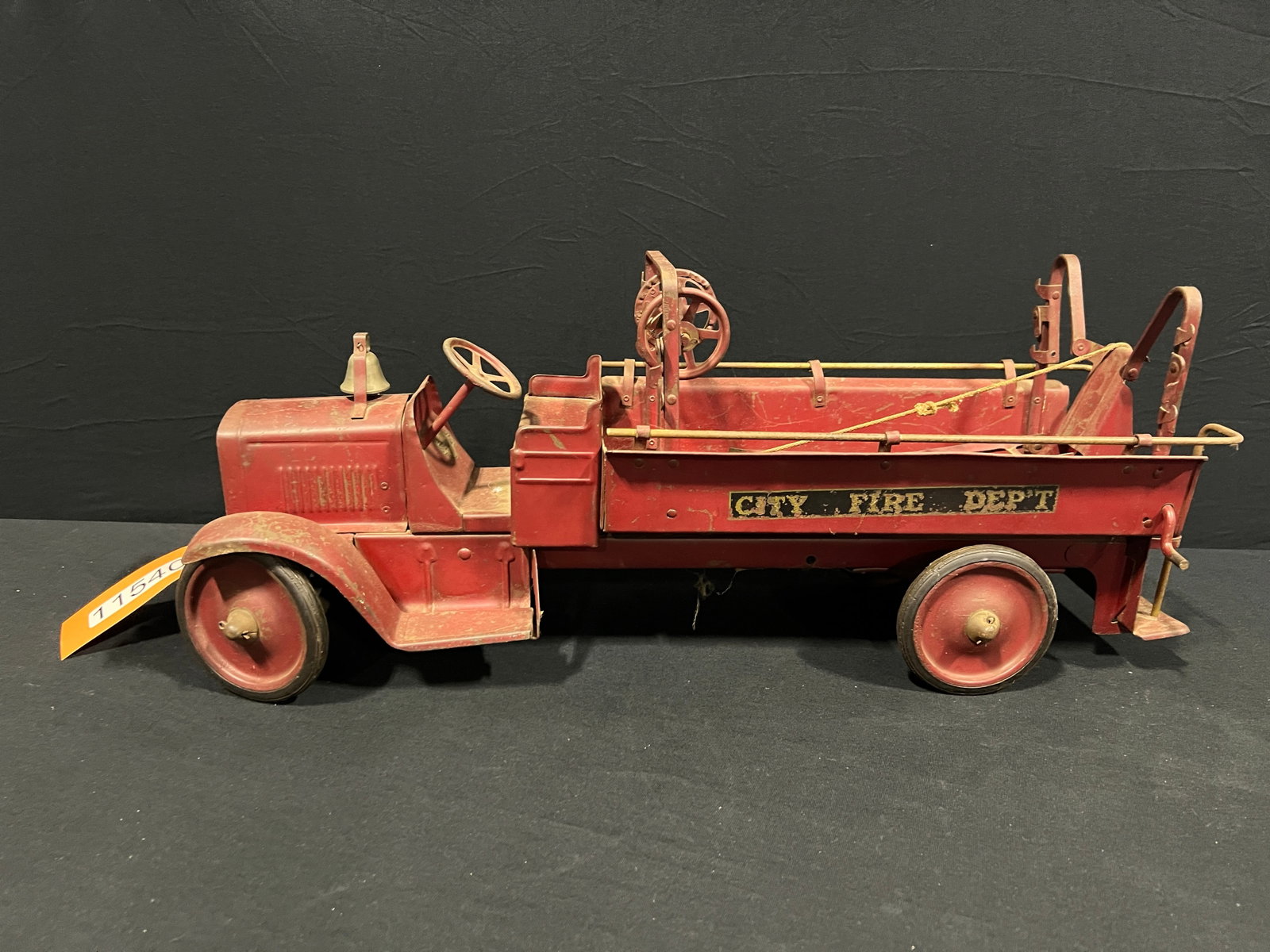 Steel Craft city fire department ladder steel truck: Original condition steel craft truck. 26" H x 8" W x 8" D.