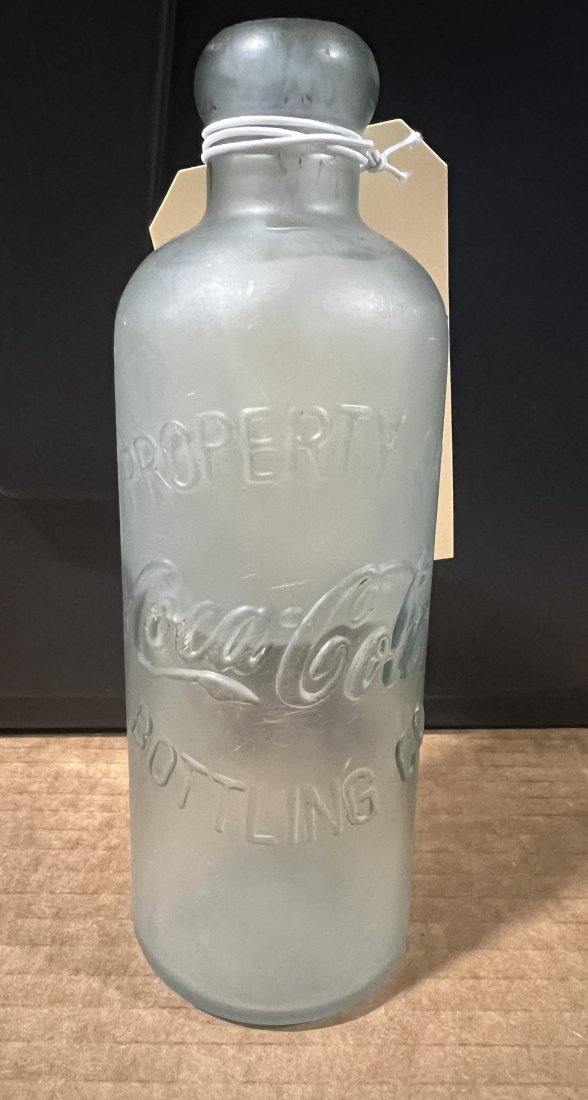 Coca Cola property of Coke bottling company bottle: Glass Coca Cola Coke bottle. 7" H x 2.5" W.