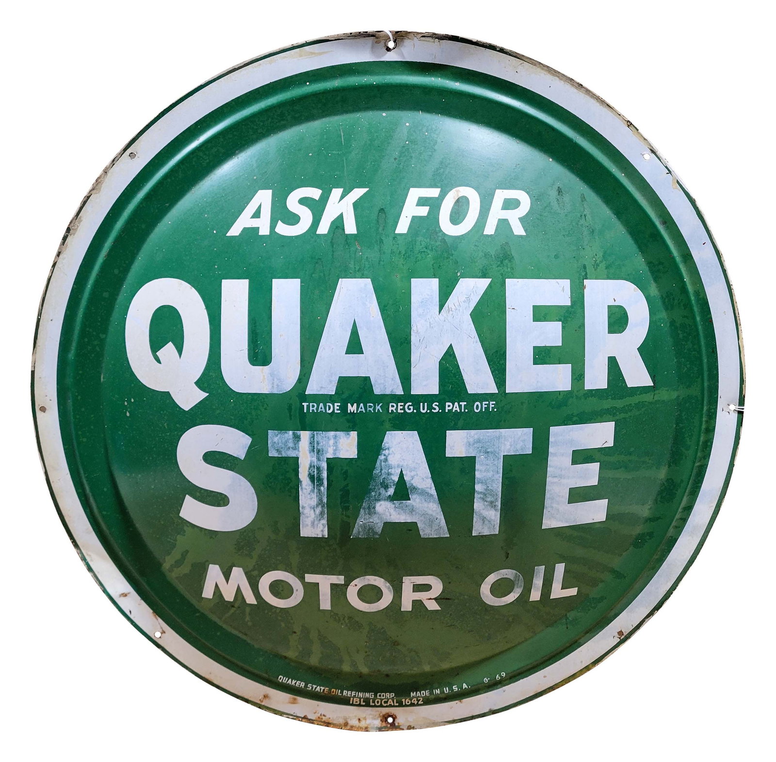 Ask for Quaker State Motor Oil 24" SST Button Sign: 24" SST convex button sign has moderate color and shine. The sign exhibits general age toning and wear throughout. Marked Made in U.S.A G - 69. PLEASE NOTE, THERE IS ONLY ONE WAY TO PAY FOR ONLINE ITE