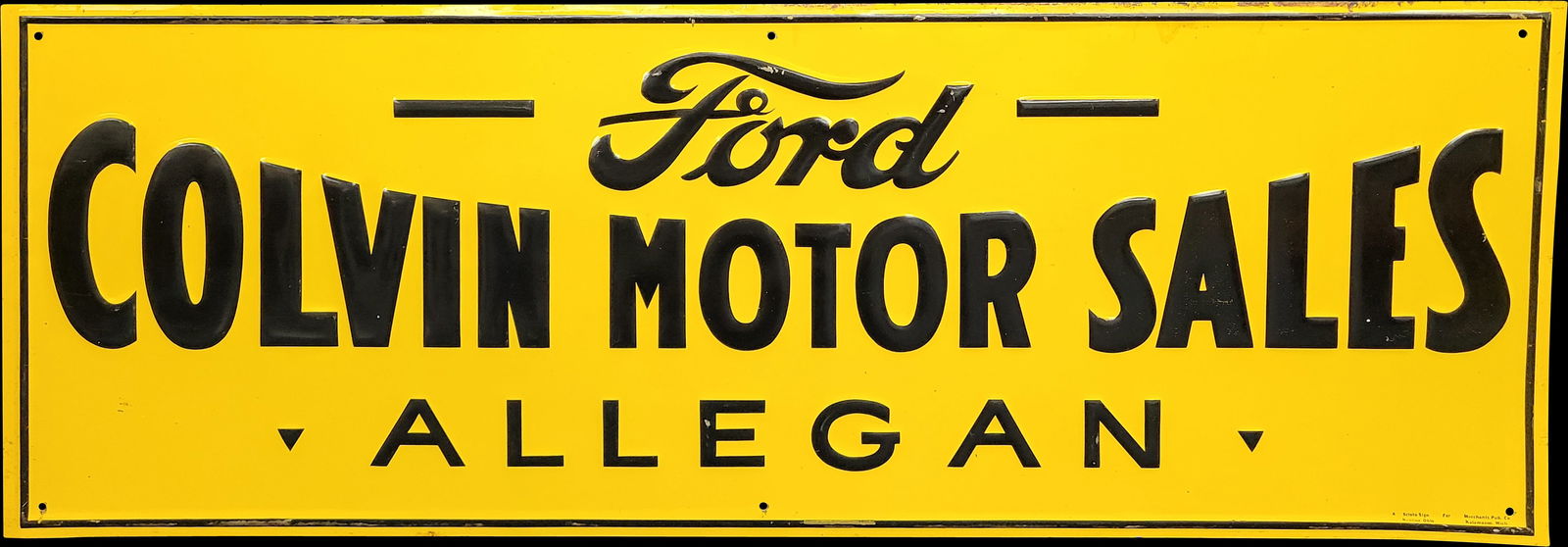 Ford Colvin Motor Sales Embossed Tin Sign: 28" x 9.75" Single sided embossed tin sign in good condition with bright color and good shine. There are minor scuffs and and a very small area of flaked paint on the top of the letter "F". Small area