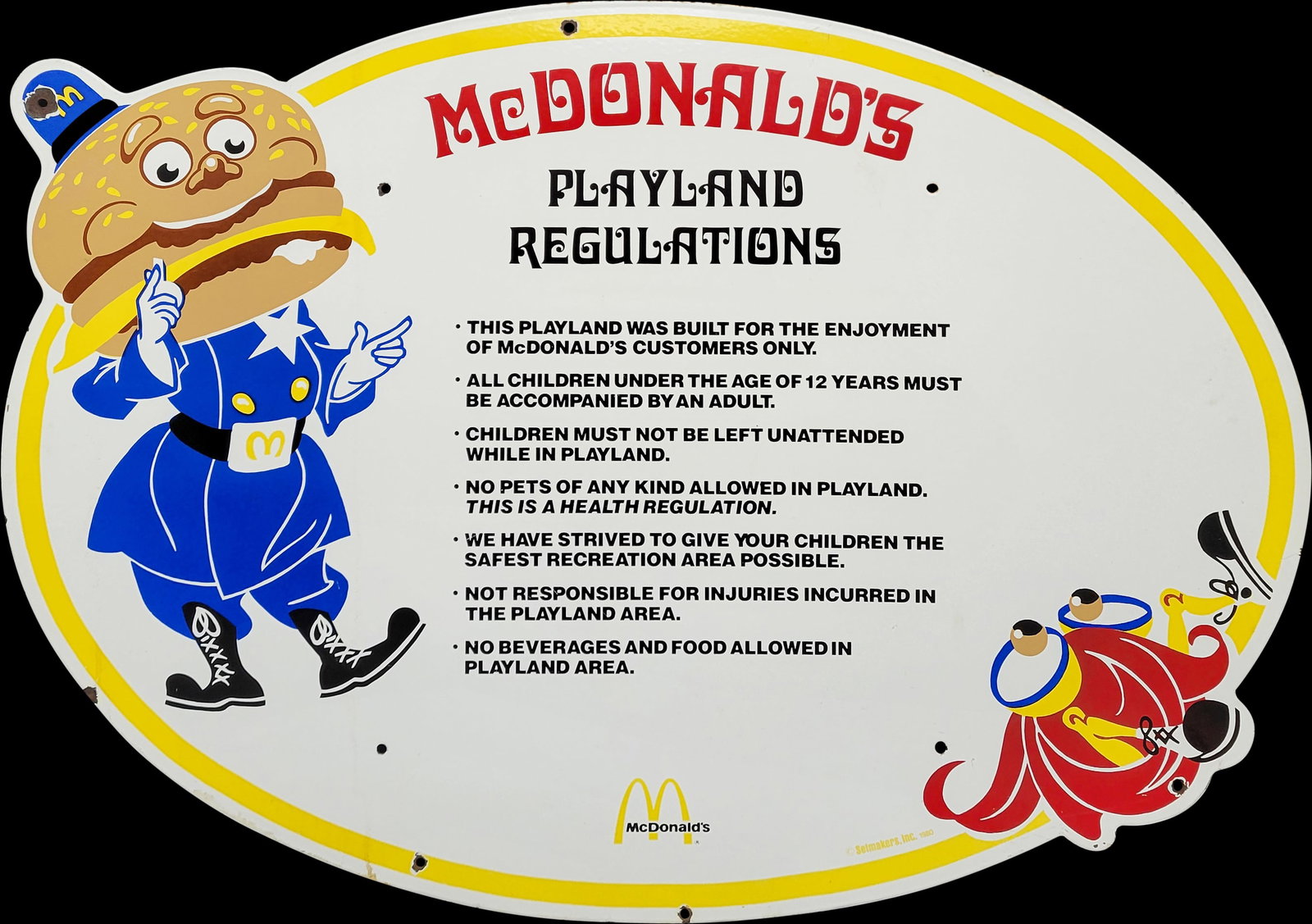 McDonalds Playland Regulations Single Sided Porcelain Sign: 41" x 29.5" SSP sign with bright colors and high gloss. There are small chips on the mounting holes and a 1" chip on the left edge. The field is very clean having only a couple of light surface scratc