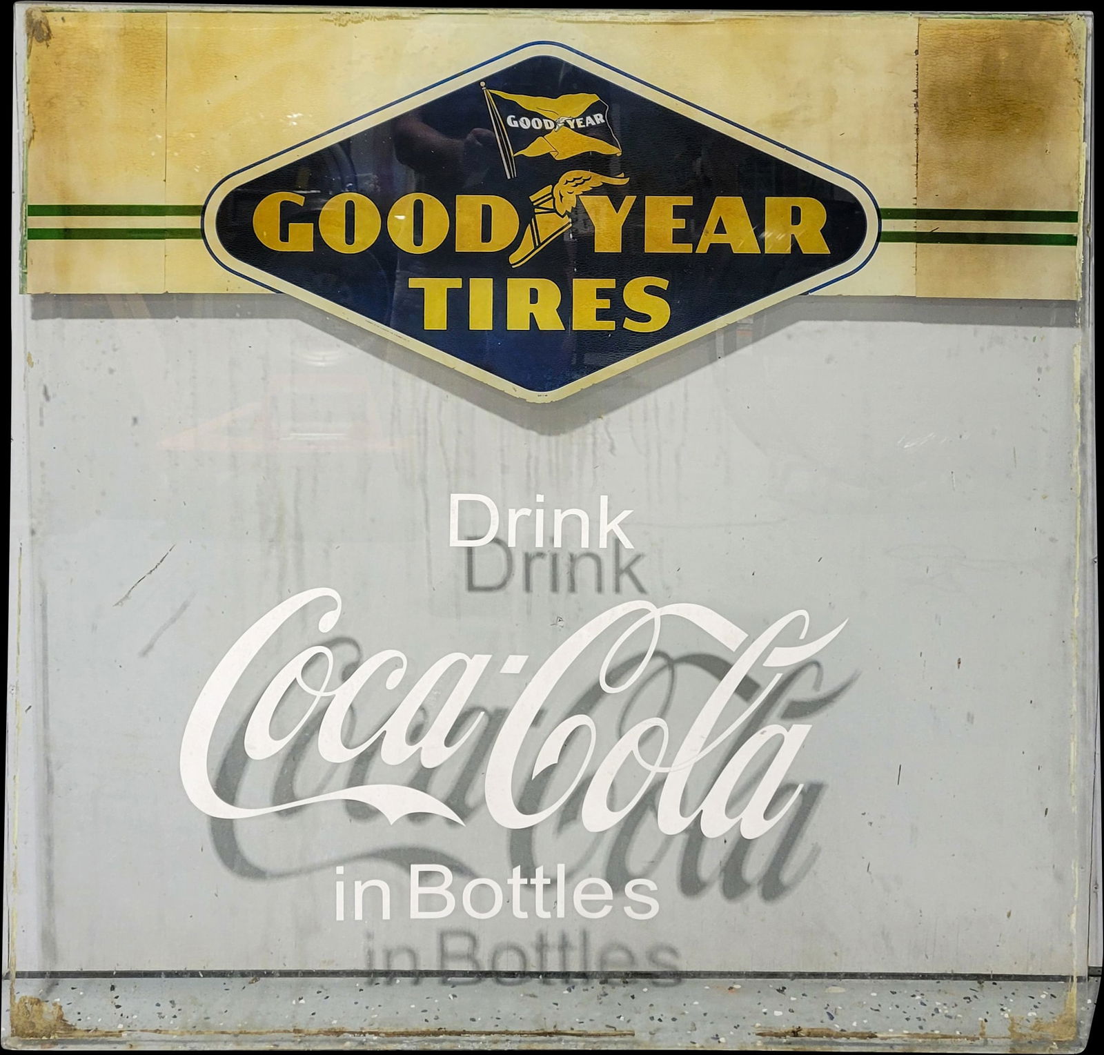 Goodyear Tires Original Serice Station Window With Coca Cola Logo: Large 45.75" x 44.5" Original glass panel with Goodyear Tires winged boot logo. There are light stains and areas of crackling. The Coca Cola In Bottles is an applied decal. The glass is .25" thick. >>