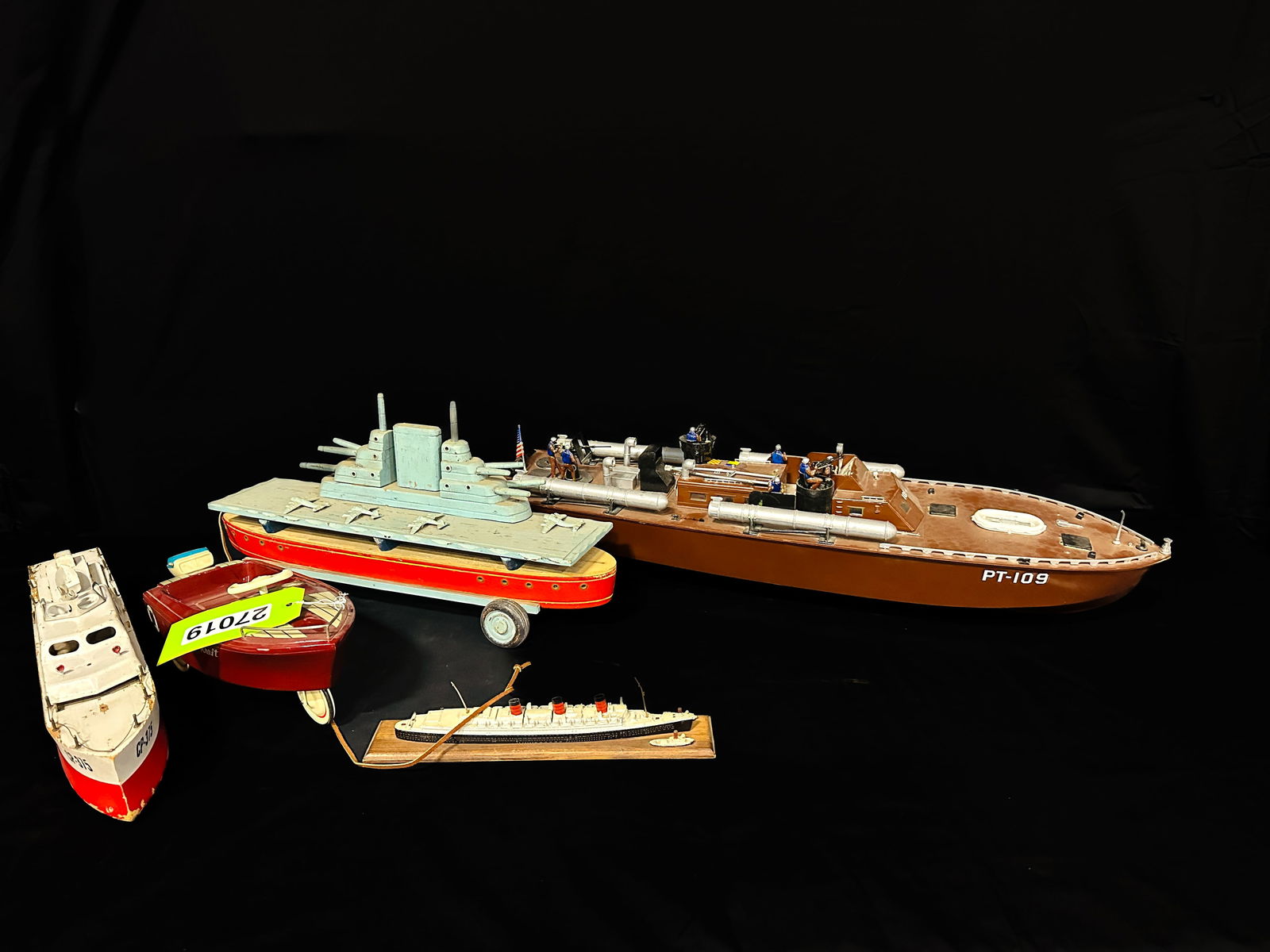 5 toy boats. Titanic model Kiddie Kraft PT-109 battleship Wind up wooden flat boat: Titanic model boat. Large PT-109 battleship boat. Kiddie Kraft metal boat. Custom wood battle ship folk art boat. Wooden flat bottom painted boat. PLEASE NOTE, THERE IS ONLY ONE WAY TO PAY FOR ONLINE