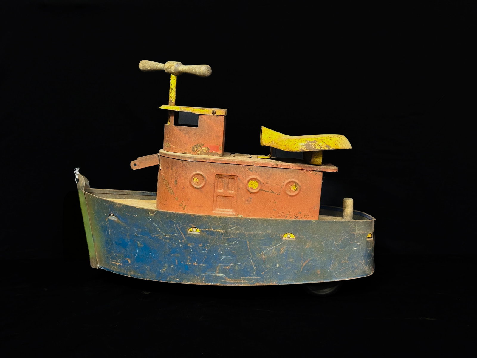 Pressed Steel Sit N Ride Tug boat Toy By Tru-Matric Toys: Pressed Steel Sit N Ride Tug boat Toy By Tru-Matric Toys. PLEASE NOTE, THERE IS ONLY ONE WAY TO PAY FOR ONLINE ITEMS IN THIS AUCTION WHICH IS THROUGH LIVE AUCTIONEERS. THIS IS THE MOST SECURE METHOD O