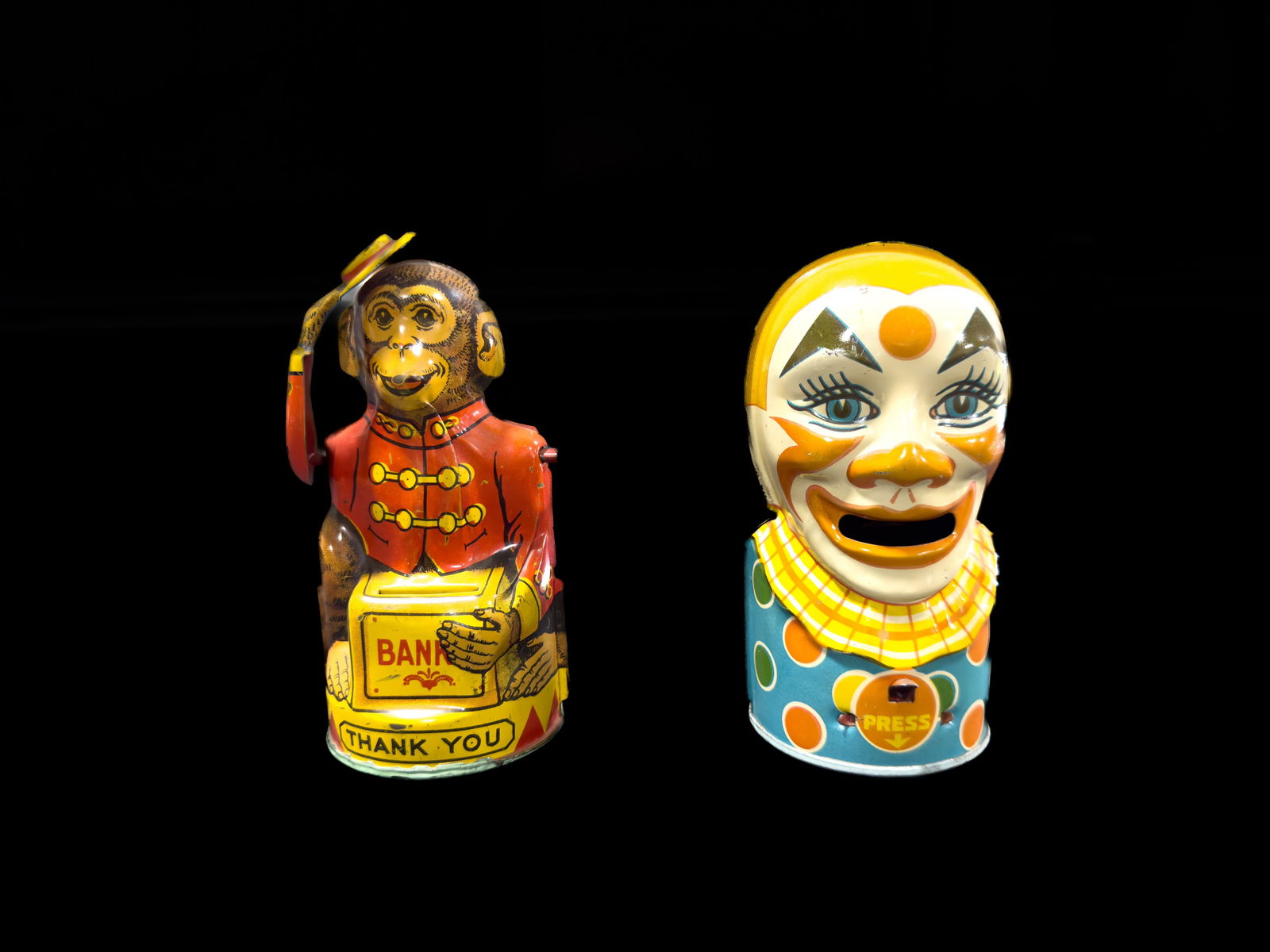 2 Chein and co tin litho clown and monkey mechanical banks (1 of 3)