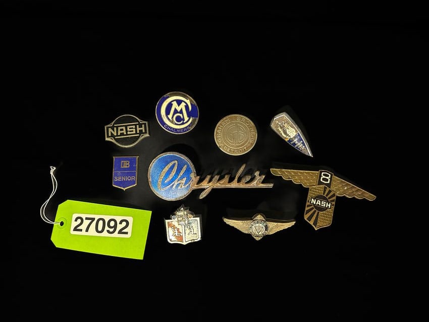 Chrysler Dodge brothers Graham Plymouth Malcom Chalmers Nash: Large lot of various engine and radiator badges. PLEASE NOTE, THERE IS ONLY ONE WAY TO PAY FOR ONLINE ITEMS IN THIS AUCTION WHICH IS THROUGH LIVE AUCTIONEERS. THIS IS THE MOST SECURE METHOD OF PAYMENT