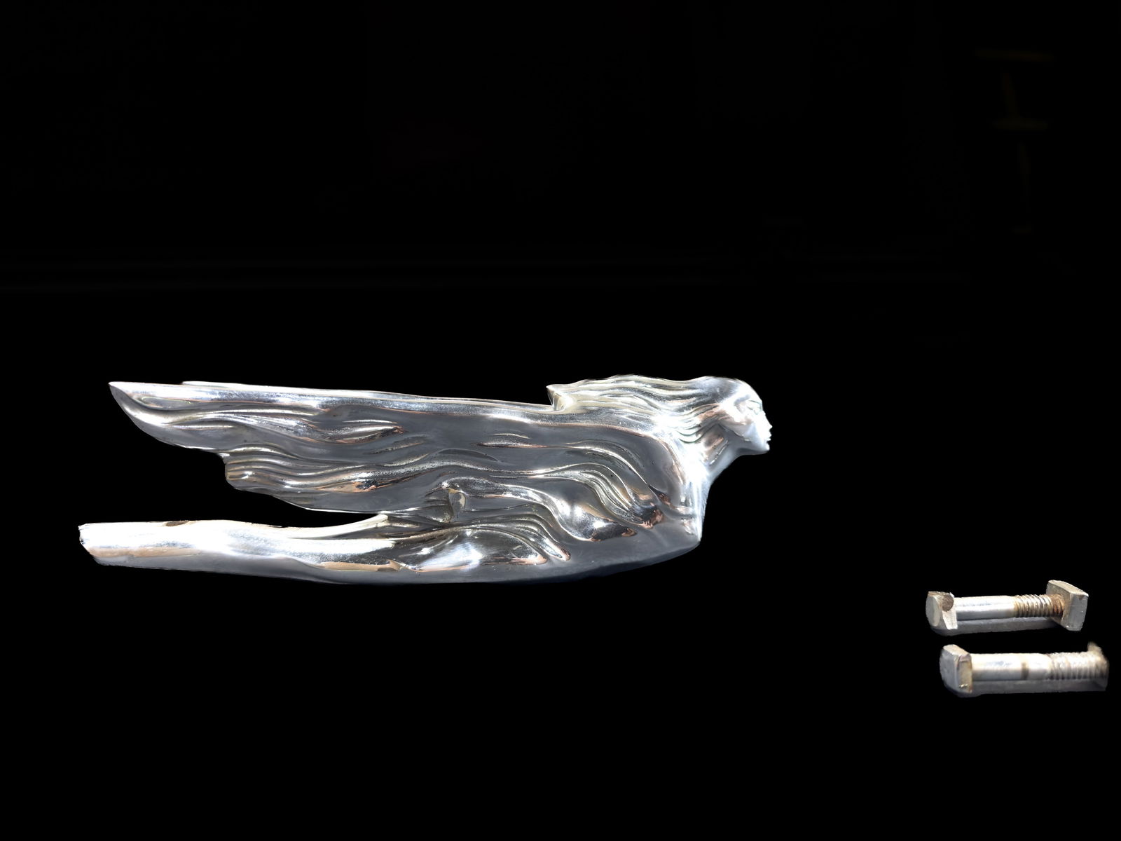 Winged goddess chrome hood ornament. Possible 1941 Cadillac? (1 of 5)