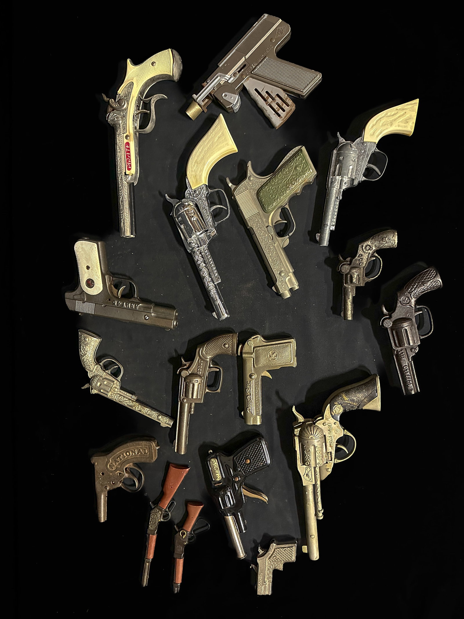 Buffalo Bill National Dough boy Wells Fargo Hubley Pony boy Scout Pirate trooper cap gun: Mixed lot of cap guns. PLEASE NOTE, THERE IS ONLY ONE WAY TO PAY FOR ONLINE ITEMS IN THIS AUCTION WHICH IS THROUGH LIVE AUCTIONEERS. THIS IS THE MOST SECURE METHOD OF PAYMENT. MAKE SURE YOUR LIVE AUCT