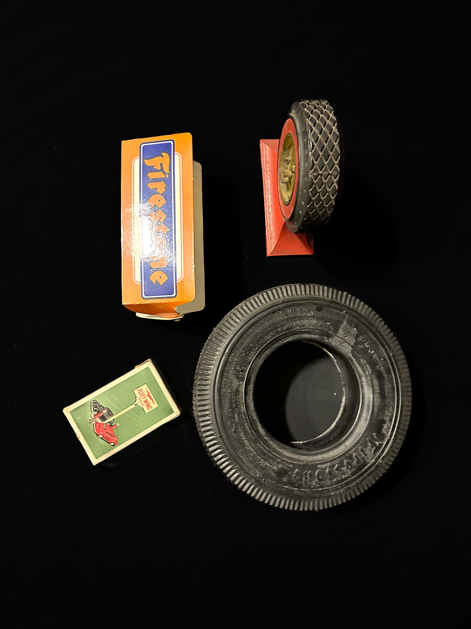 Firestone tire display. Goodyear lux clocks Fleet Wing playing cards (1 of 2)