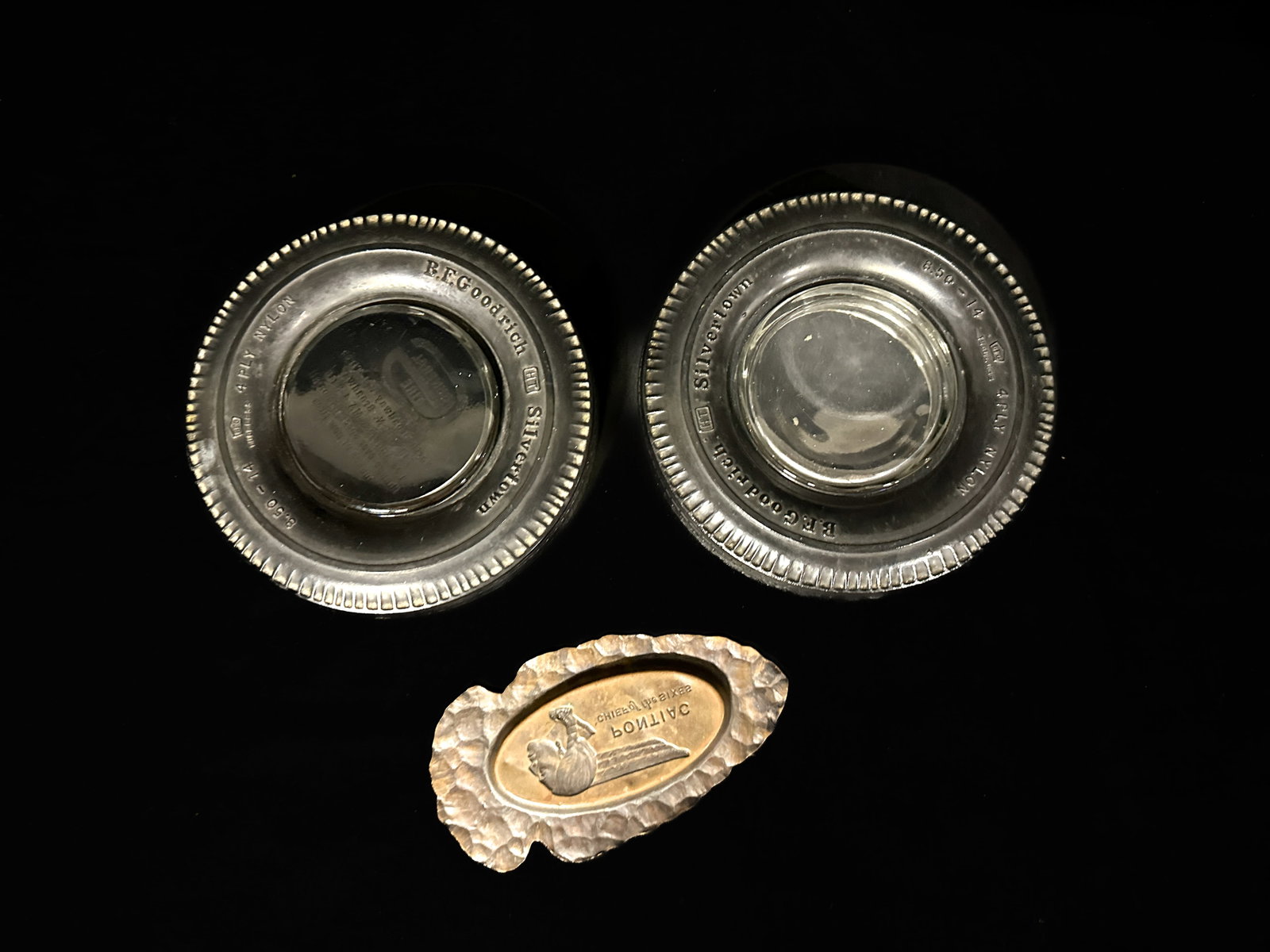 Pontiac Ash Tray BF Goodrich Silvertown General tire ash tray: Pontiac Ash Tray BF Goodrich Silvertown General tire ash tray. PLEASE NOTE, THERE IS ONLY ONE WAY TO PAY FOR ONLINE ITEMS IN THIS AUCTION WHICH IS THROUGH LIVE AUCTIONEERS. THIS IS THE MOST SECURE MET