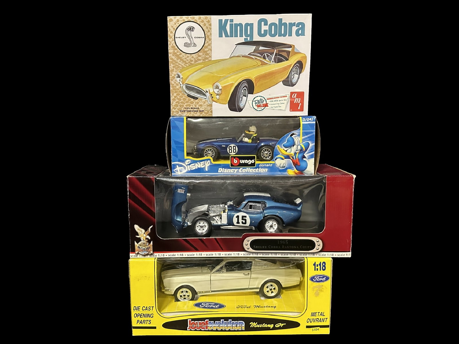 Mustang GT350 1965 Ford Shelby cobra Daytona Burago Disney cobra AMT king Cobra kit: Mustang GT350 1965 Ford Shelby cobra Daytona Burago Disney cobra AMT king Cobra kit. PLEASE NOTE, THERE IS ONLY ONE WAY TO PAY FOR ONLINE ITEMS IN THIS AUCTION WHICH IS THROUGH LIVE AUCTIONEERS. THIS 