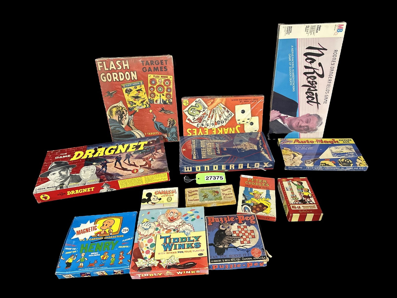 Vintage games Auto Magic Picture gun Flash Gordon Mickey Mouse Peter Coddle?s Pirate traveler: Mixed lot of vintage games. Most have been resealed and I do not know if the games are complete. I believe flash gordon is missing the guns. Rodney Dangerfield no respect board game included. Auto Mag