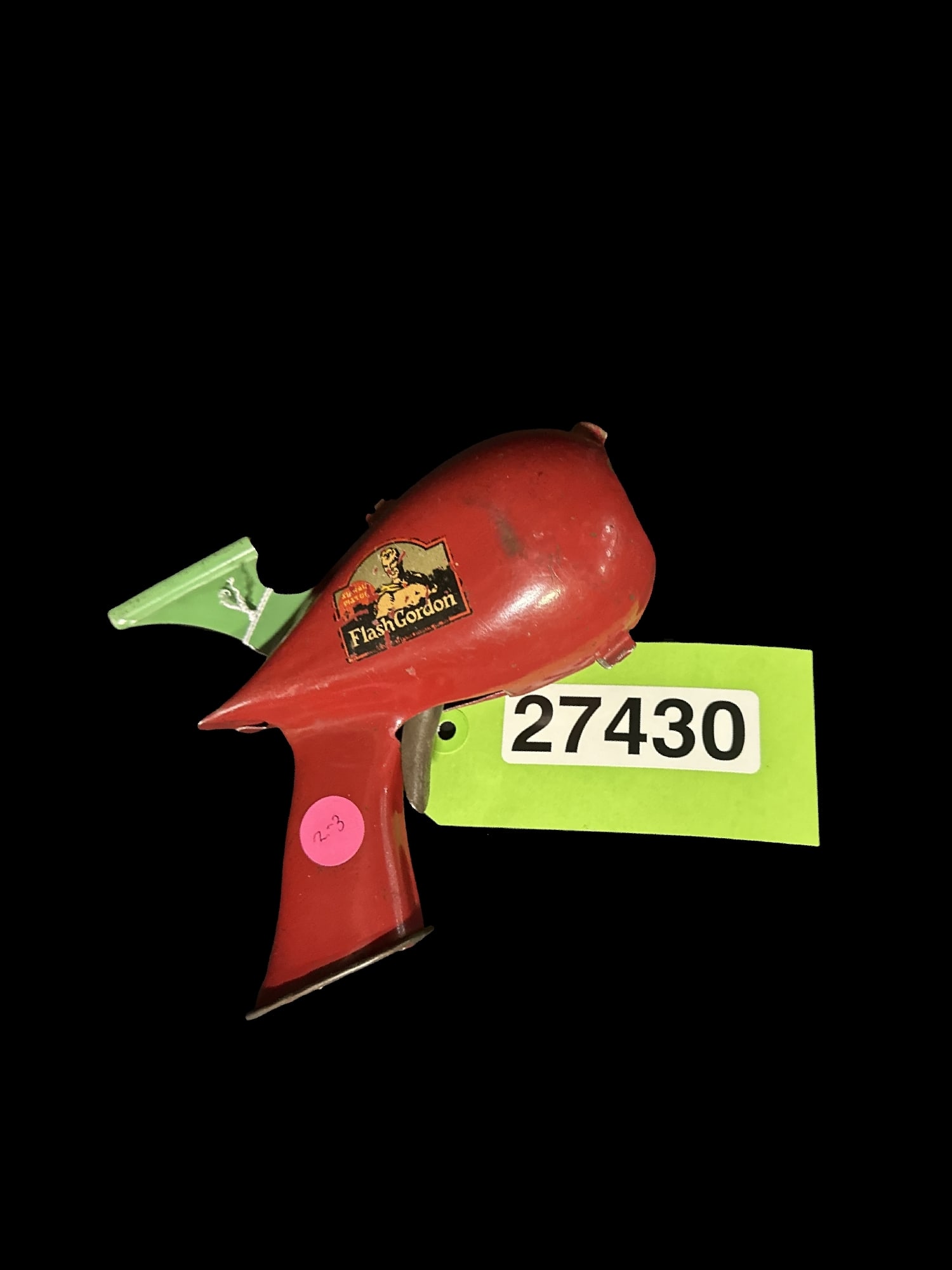Flash Gordon metal toy gun: Trigger sticks, but can get it to work if pulled correctly. PLEASE NOTE, THERE IS ONLY ONE WAY TO PAY FOR ONLINE ITEMS IN THIS AUCTION WHICH IS THROUGH LIVE AUCTIONEERS. THIS IS THE MOST SECURE METHOD