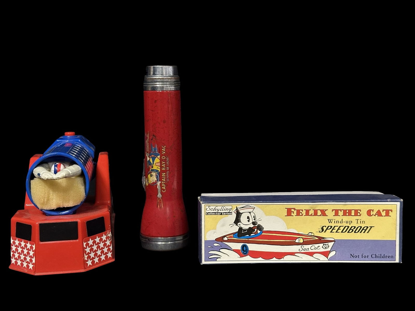 Captain Rayovac flashlight Human Cannon Felix the cat wind up tin speedboat (1 of 2)
