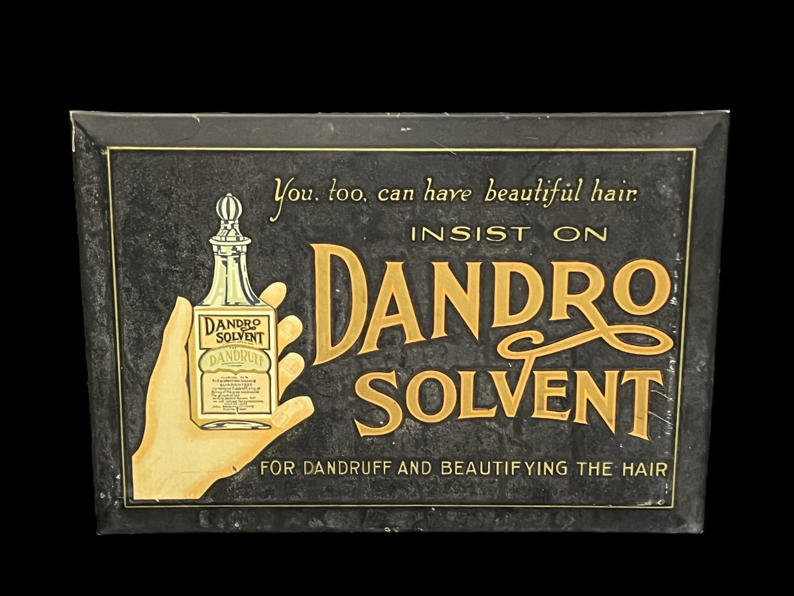 Insist on Dandro Solvent Dandruff and hair tonic.: Tin over cardboard stand up display. Very clean front. Light shelf wear on right side after the text. Graphics are very clear, really neat piece. PLEASE NOTE, THERE IS ONLY ONE WAY TO PAY FOR ONLINE I