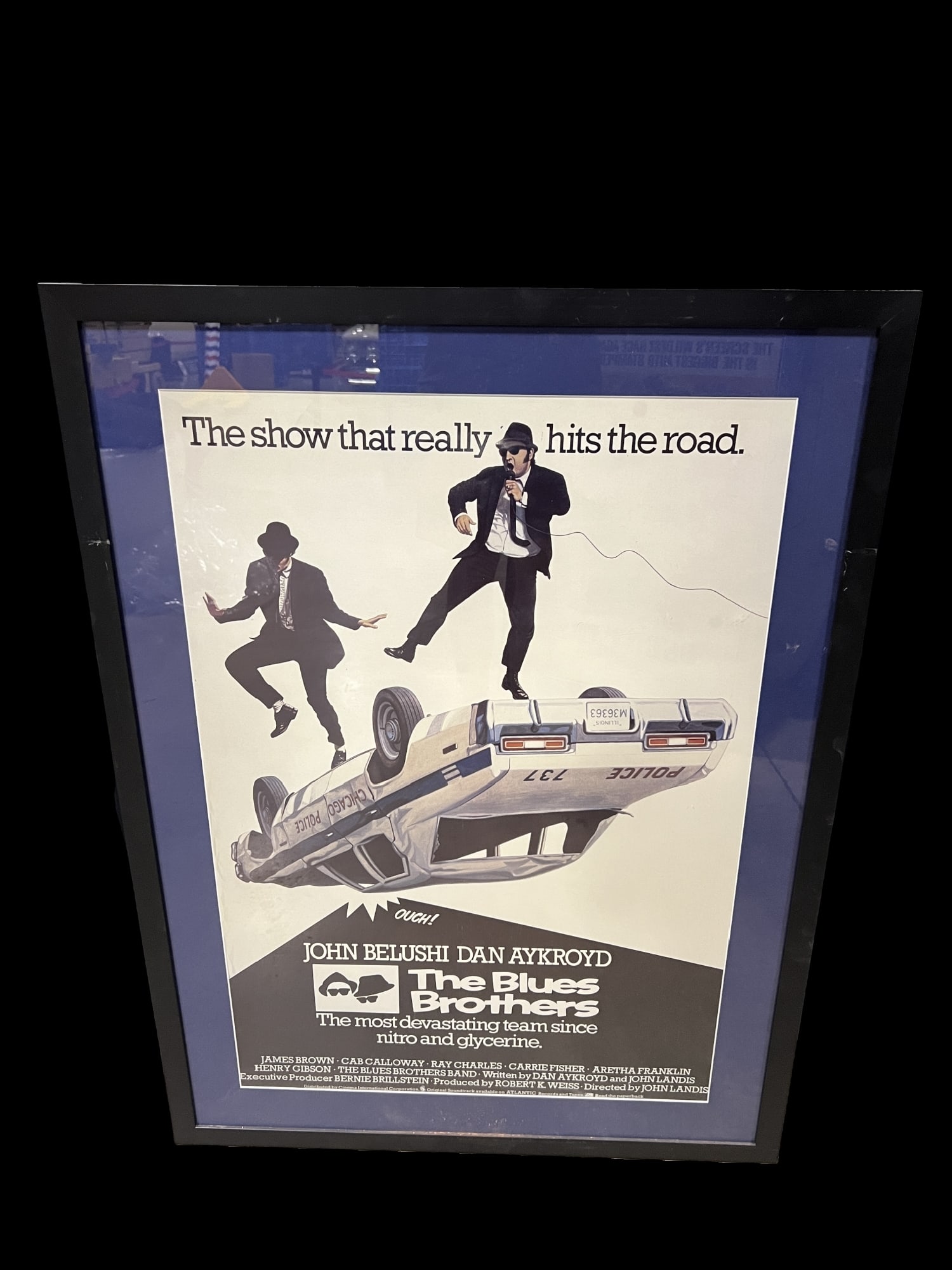 Blues brothers framed move poster John Belushi Dan Aykroyd: Nicely framed movie poster of the blues brothers movie. PLEASE NOTE, THERE IS ONLY ONE WAY TO PAY FOR ONLINE ITEMS IN THIS AUCTION WHICH IS THROUGH LIVE AUCTIONEERS. THIS IS THE MOST SECURE METHOD OF 
