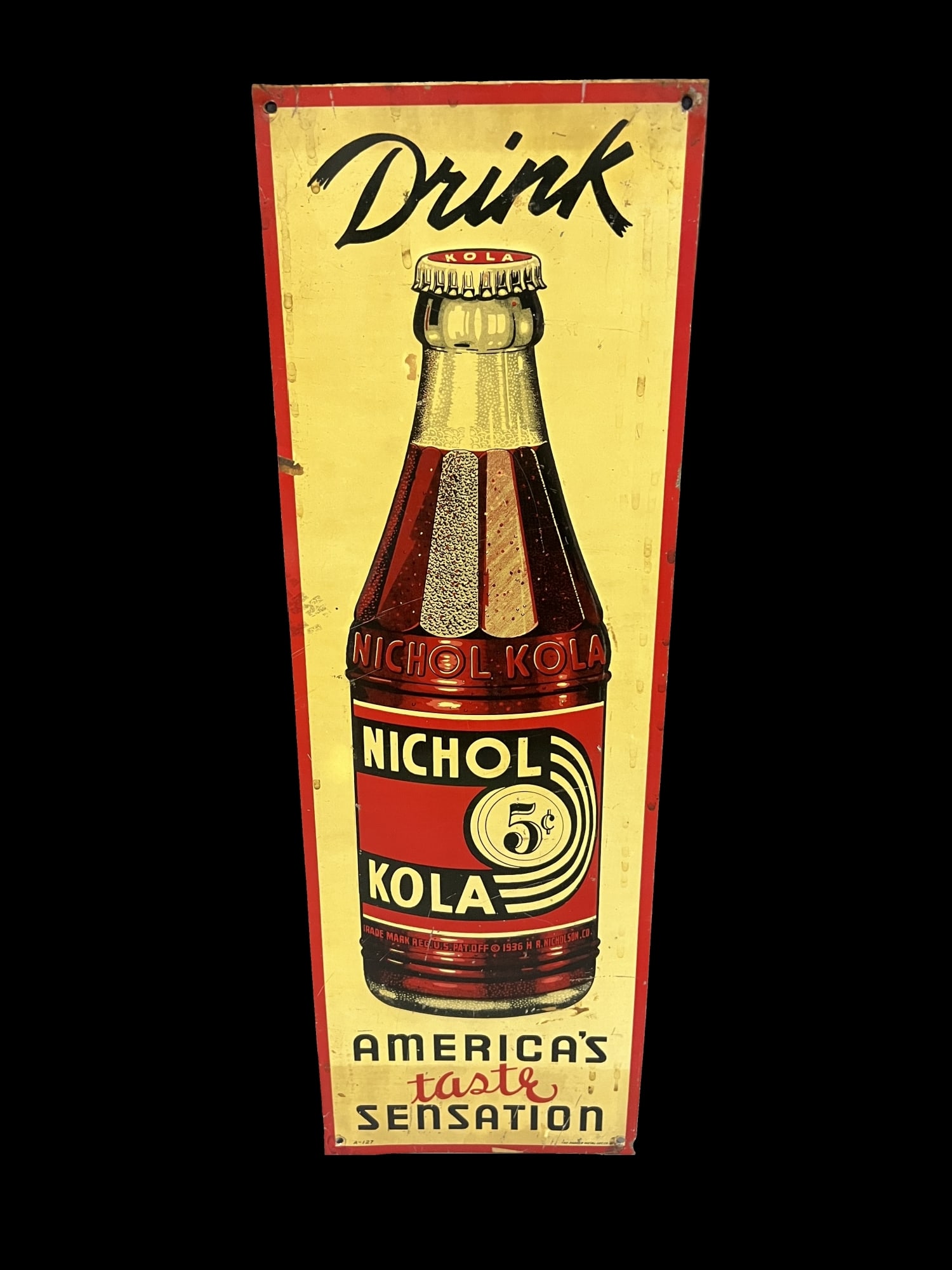Nichol Kola tin metal soda sign: Dulling of color, has been displayed most of its life. 8" H x 24" W.