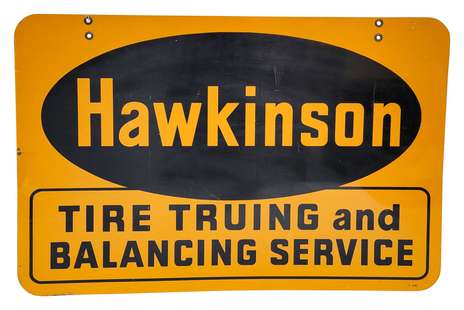 Hawkinson Tire Truing and Balancing Service DST Sign: 24" x 36", DST sign has very good color and shine. The display has fine scratches and light wear. The reverse has additional wear in the fields and perimeter. The sign retains both factory grommets an