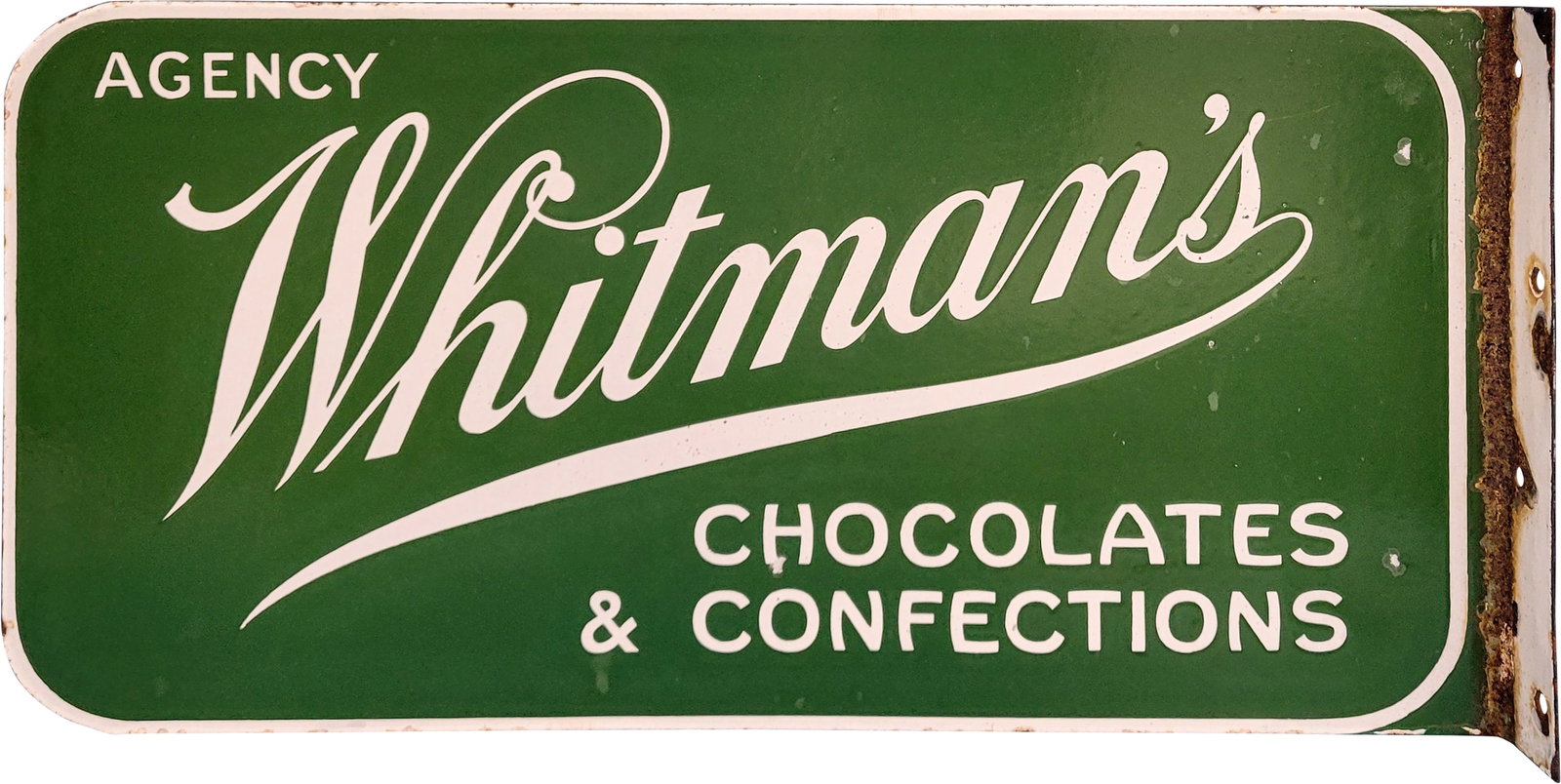 Whitman's Chocolates and Confections Agency DSP Flange Sign: 20" x 10" DSP flange sign displays good color and good gloss on both sides. One side has several flea bite sized chips in the field. The flange section has porcelain loss with surface rust.